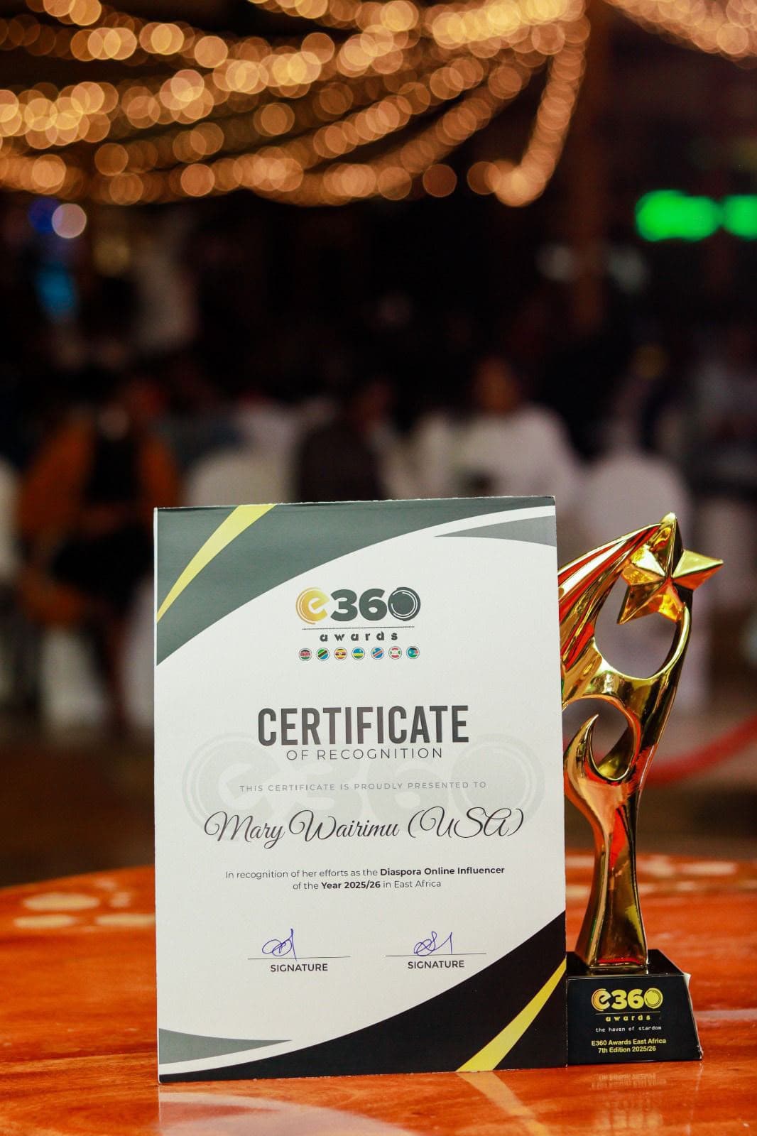 E360 Awards certificate of recognition and trophy