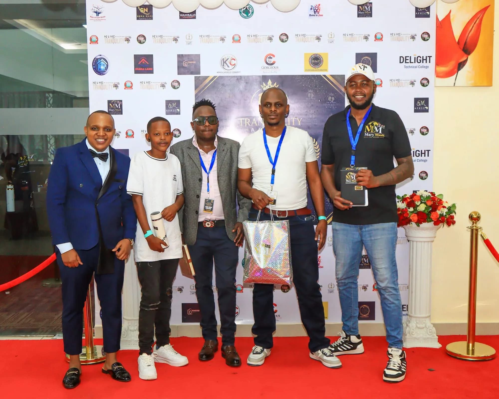 Guests lined up on the red carpet holding Mary Mash 2026 journals